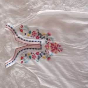 Embroidered sleevless white top